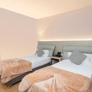 Habitación con 2 Camas Individuales